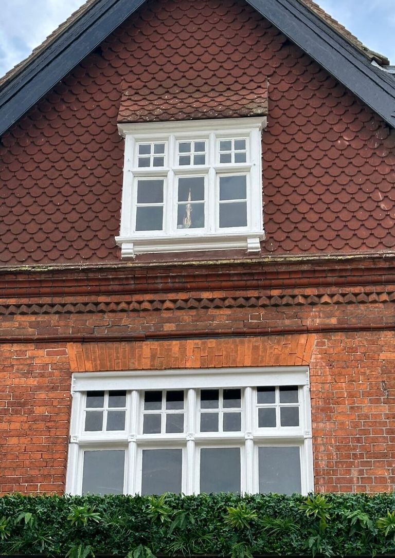 Window with brick quoins